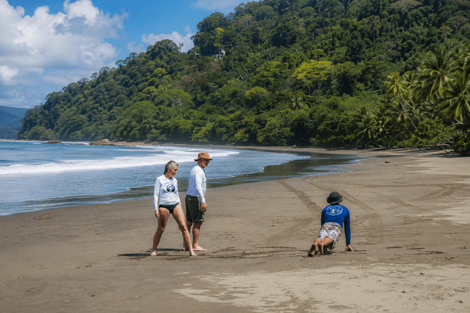 Group practicing surf pop up on tropical Costa Rica beach